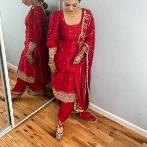 Red raw silk salwar suit with gota pati